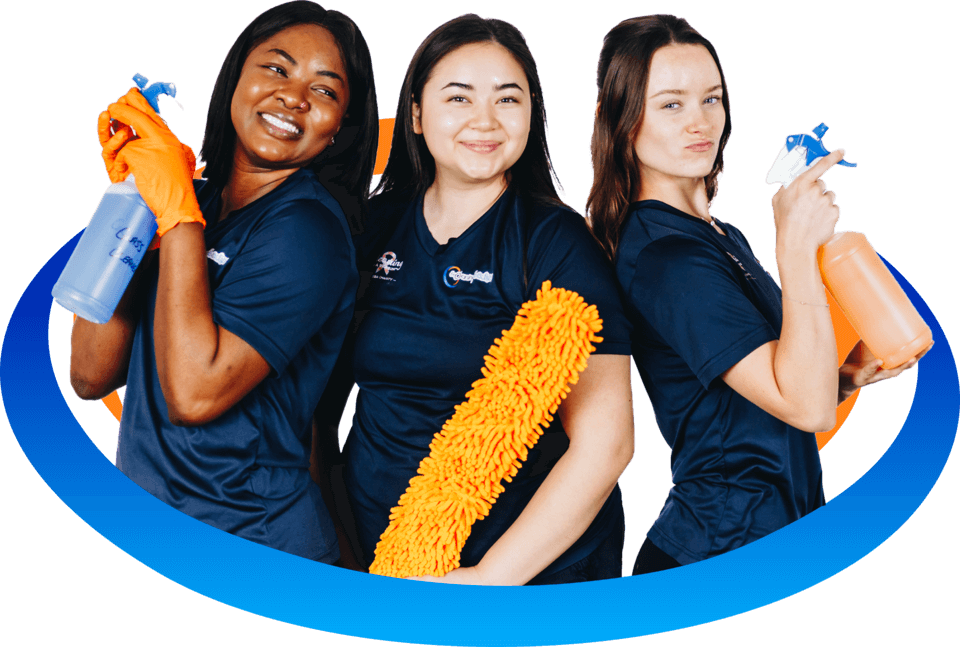 Two cleaning techs back to back with their arms crossed